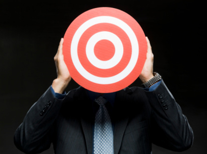 businessman with a target in front of his face